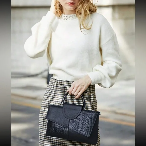 Black snakeskin print vegan leather clutchcrossbody bag